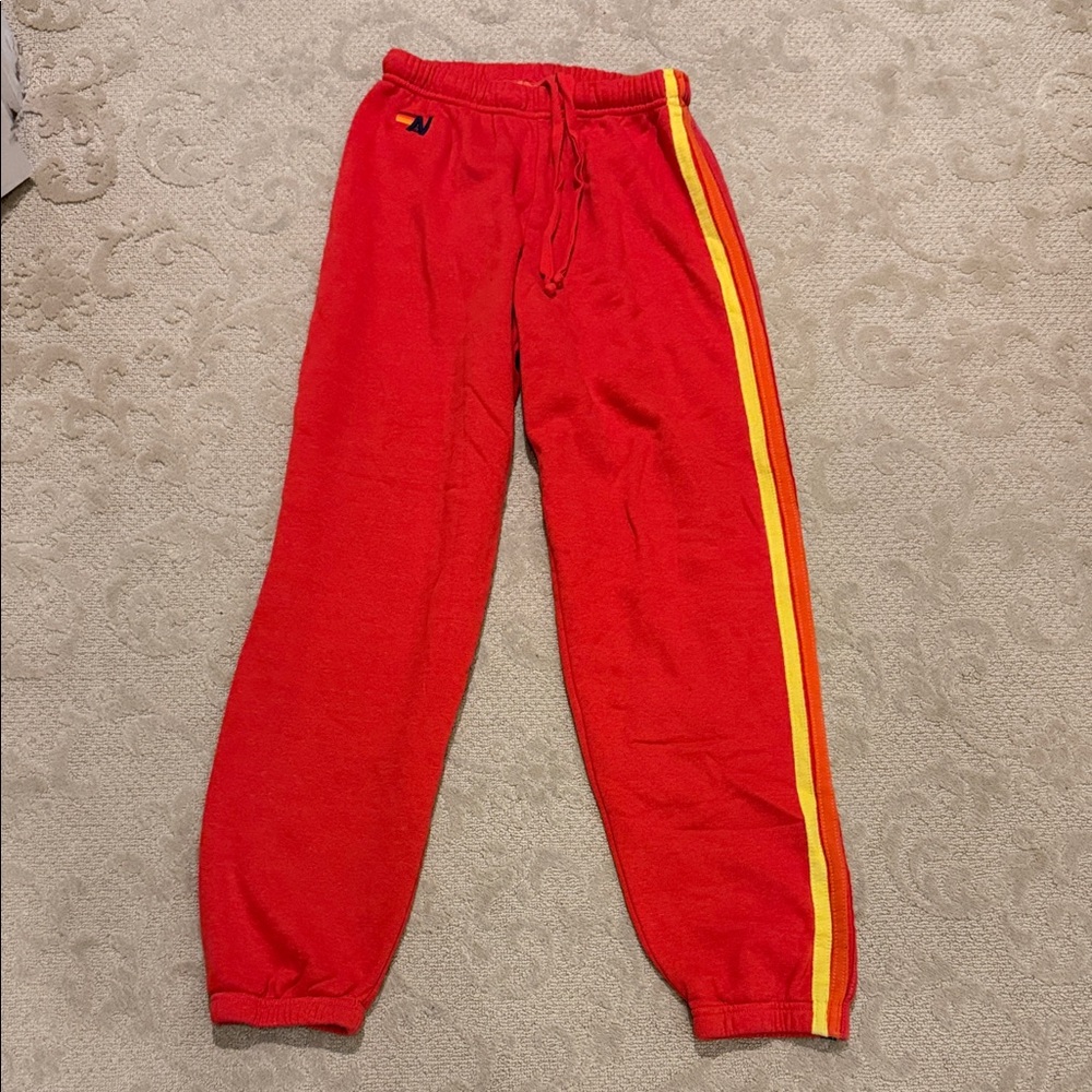 Aviator Nation Red Track Pants with Yellow Stripe